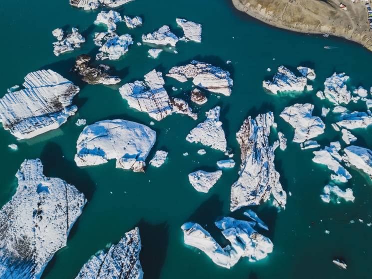 Icebergs float in the Jokulsarlon glacial lagoon in Iceland. The glacier that feeds this lagoon is retreating rapidly.