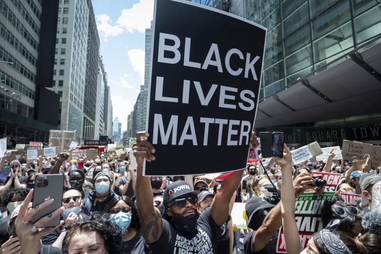 group of protestors with Black Lives Matter signs