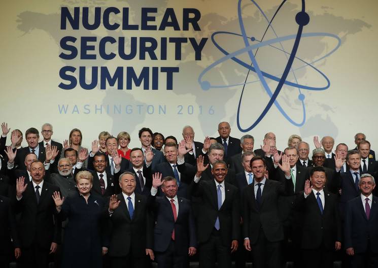 world leaders pose for family photo