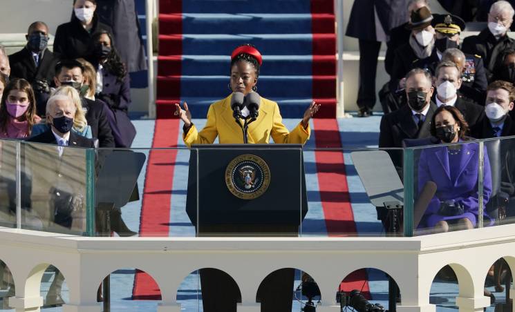 American poet Amanda Gorman reads a poem during the 59th inaugural ceremony on the West Front of the U.S. Capitol on January 20, 2021 in Washington, DC. During today's inauguration ceremony Joe Biden becomes the 46th president of the United States.; Getty