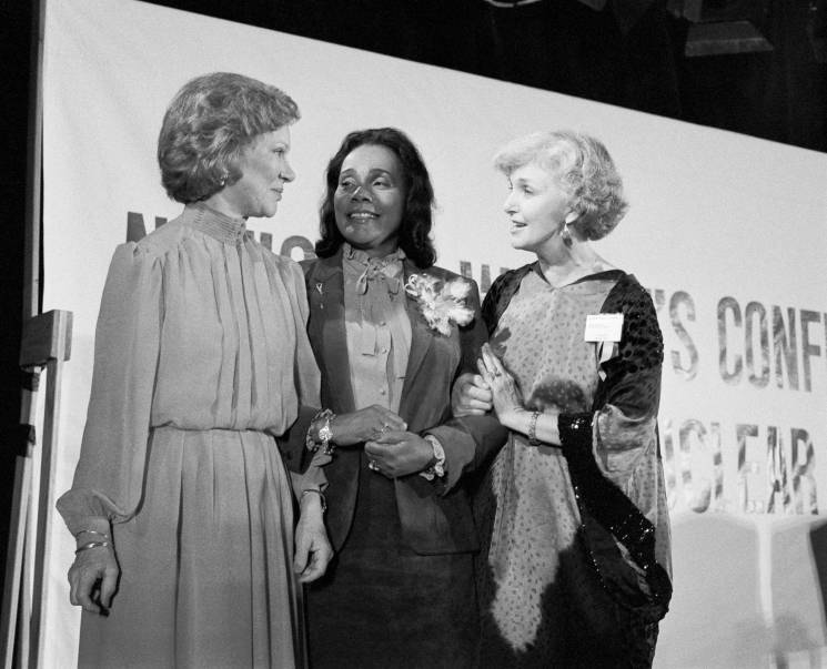 three women standing together