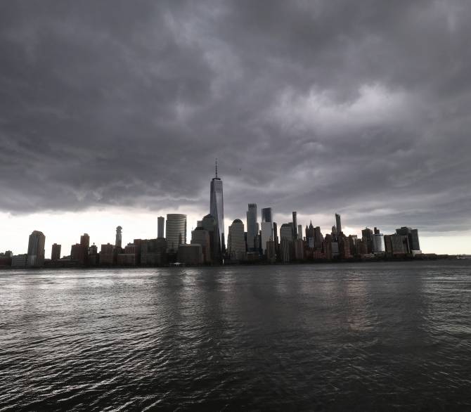 A rain storm passes over lower Manhattan and One World Trade Center in New York City on May 11, 2020 as seen from Jersey City, New Jersey.; Getty