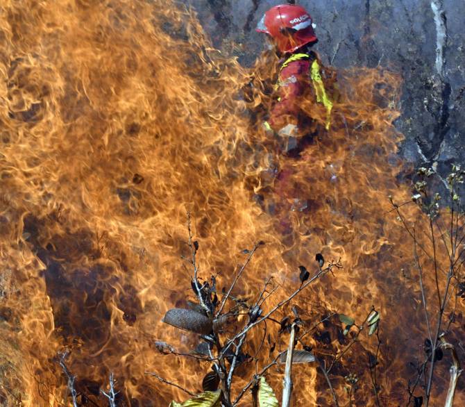 Firefighter in Bolivia; Getty