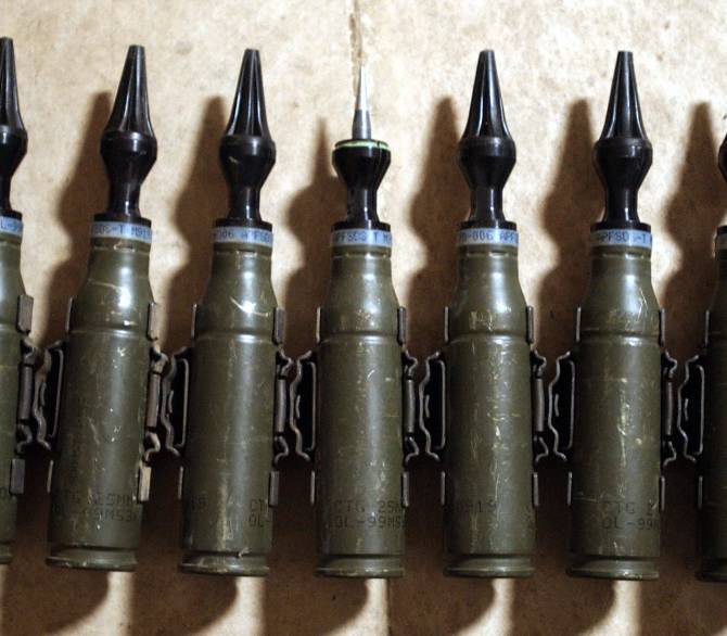 A row of US Army 25mm rounds of depleted uranium ammunition,