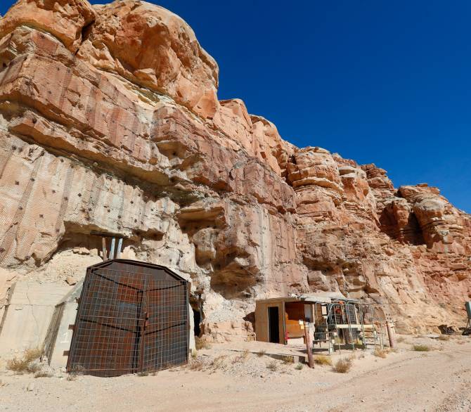 Entrances to a uranium mine are locked shut outside Ticaboo, Utah. Credit: Photo by George Frey/Getty Images