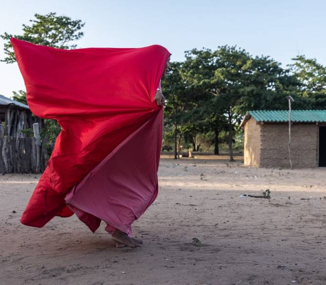 A member of the Wayuu people performs a traditional dance to welcome executives of Grupo Energía Bogotá.