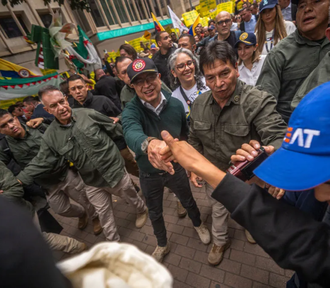 President of Colombia Gustavo Petro joins the march and greets his followers as part of the 2024 International Workers Day on May 1, 2024 in Bogota, Colombia.