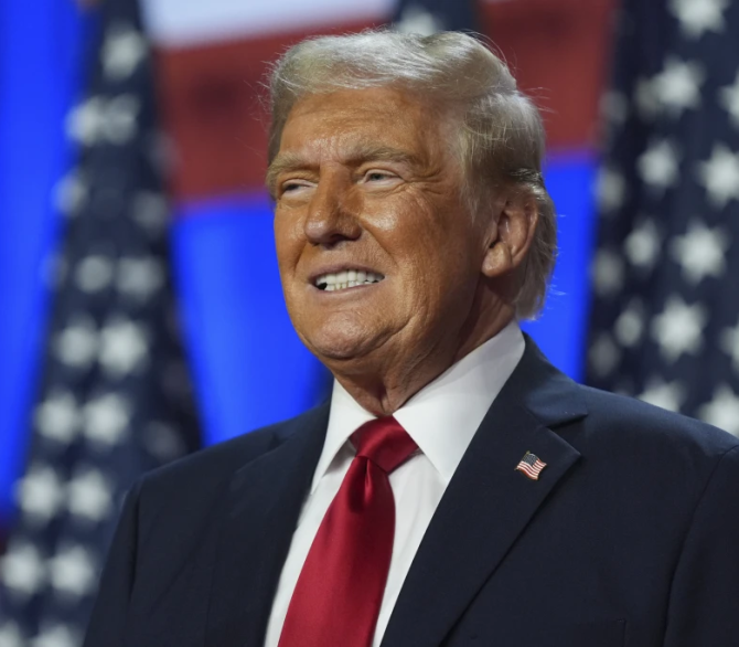 Republican presidential nominee former President Donald Trump smiles at an election night watch party at the Palm Beach Convention Center, Nov. 6, 2024, in West Palm Beach, Fla. 