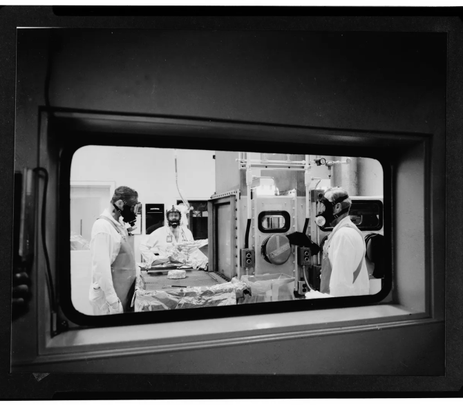 This archival photo shows downdraft tables at the Rocky Flats Plant, Plutonium Manufacturing Facility, in Golden, Colorado. Building 707 was the primary plutonium manufacturing and assembly facility at the plant from 1970 until curtailment of operations in 1989. 