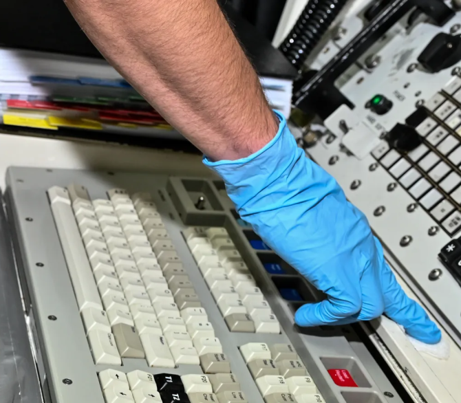 An Air Force member takes environmental samples at a Minuteman III missile alert facility near Stoneham, Colorado, July 13, 2023. The samples were taken as part of an ongoing study of cancer risk in the missile community.