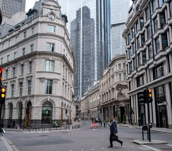 View looking along Threadneedle Street past old low rise financial buildings in the City of London on June 3 2025 in London, United Kingdom. 