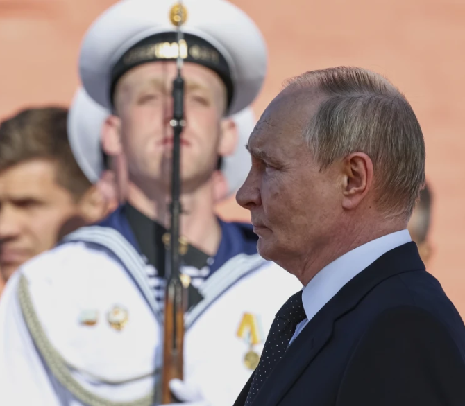 Russian President Vladimir Putin arrives to attend a flag raising ceremony of the Knyaz Pozharsky nuclear-powered Borei-A class submarine in Severodvinsk, Russia, Thursday, July 24, 2025. 