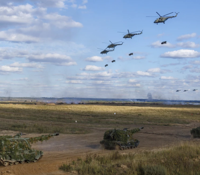 This photo released by the Russian Defense Ministry Press Service shows joint exercises of the Russian and Belarusian armed forces at the Mulino training ground in Russia’s Nizhny Novgorod region on Sept. 11, 2021. 