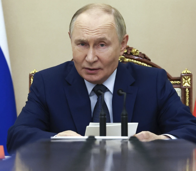 Russian President Vladimir Putin chairs a Security Council meeting at the Kremlin in Moscow, Monday, Sept. 22, 2025.