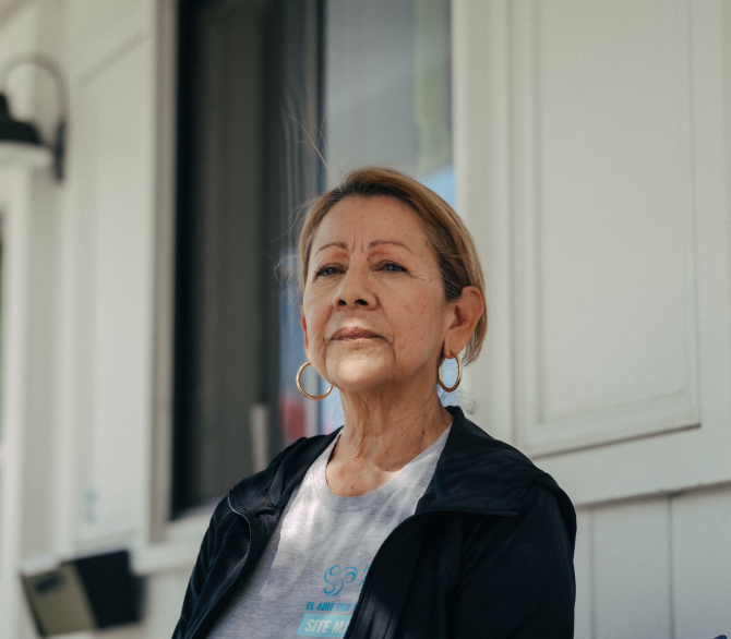 Eileen Miranda outside her home in La Mirada, California, in March. She is among many Latinos in the US who have installed monitors to stay informed about their neighborhoods’ air quality.