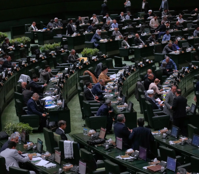 Iranian lawmakers attend an open session of parilament in Tehran, Iran, Sunday, Sept. 28, 2025.