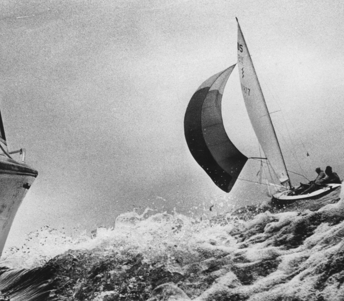 Strong wind and choppy waves were a challenge for Lightning sailor Mike Haggerty off the Milwaukee Yatch Club shore in August, 1971.