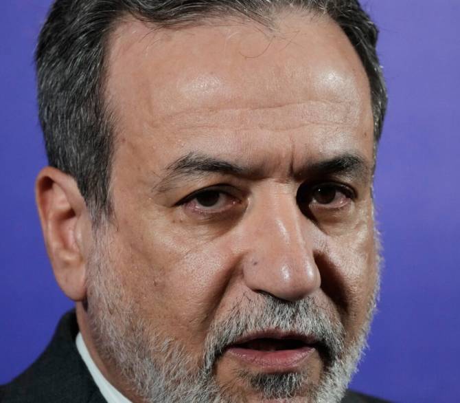 Iranian Foreign Minister Abbas Araghchi speaks in a new briefing after attending a conference titled “International Law Under Assault: Aggression and Self-Defense,” in Tehran, Iran, Sunday, Nov. 16, 2025. 