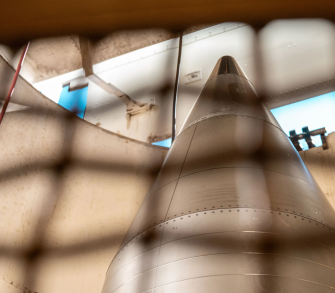 Pictured is a Minuteman III intercontinental ballistic missile during a weapons transfer operation near Sydney, Nebraska, Feb. 5, 2025. A weapons transfer operation allows for 90 MMXS to move MMIII ICBM components back to F.E. Warren Air Force Base for routine maintenance ensuring sustainability. 