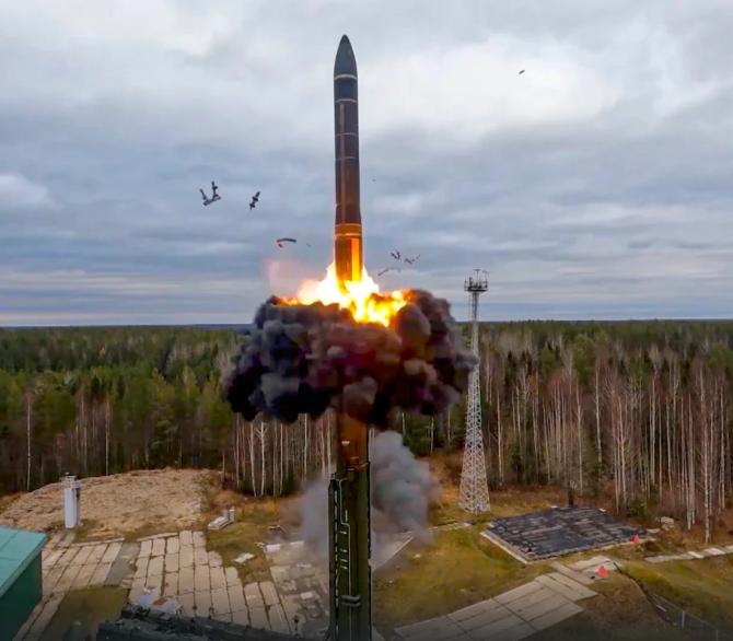In this photo taken from video released by Russian Defense Ministry Press Service on Oct. 26, 2022, a Yars intercontinental ballistic missile is test-fired as part of Russia's nuclear drills from a launch site in Plesetsk, northwestern Russia.