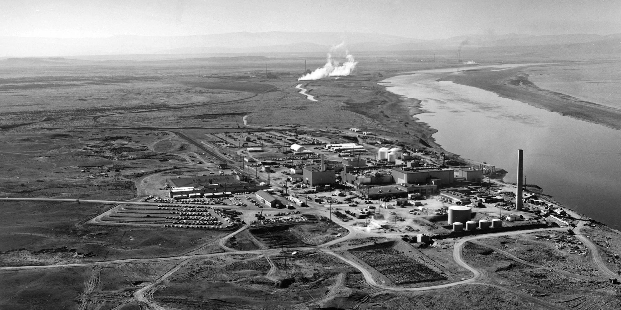 An aerial view of a sprawling nuclear power next to a river.